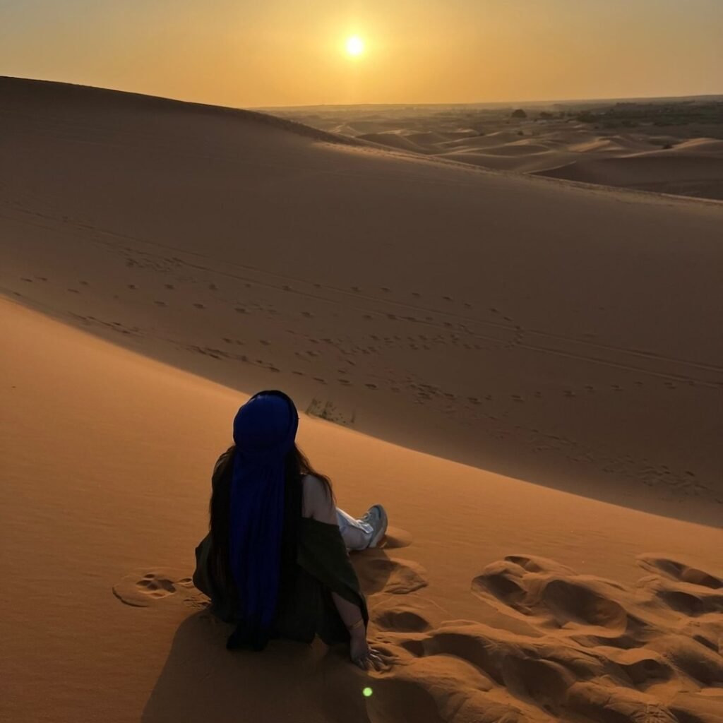 Traveler enjoying the Sahara dunes on 4 Days Tour from Marrakech to Merzouga